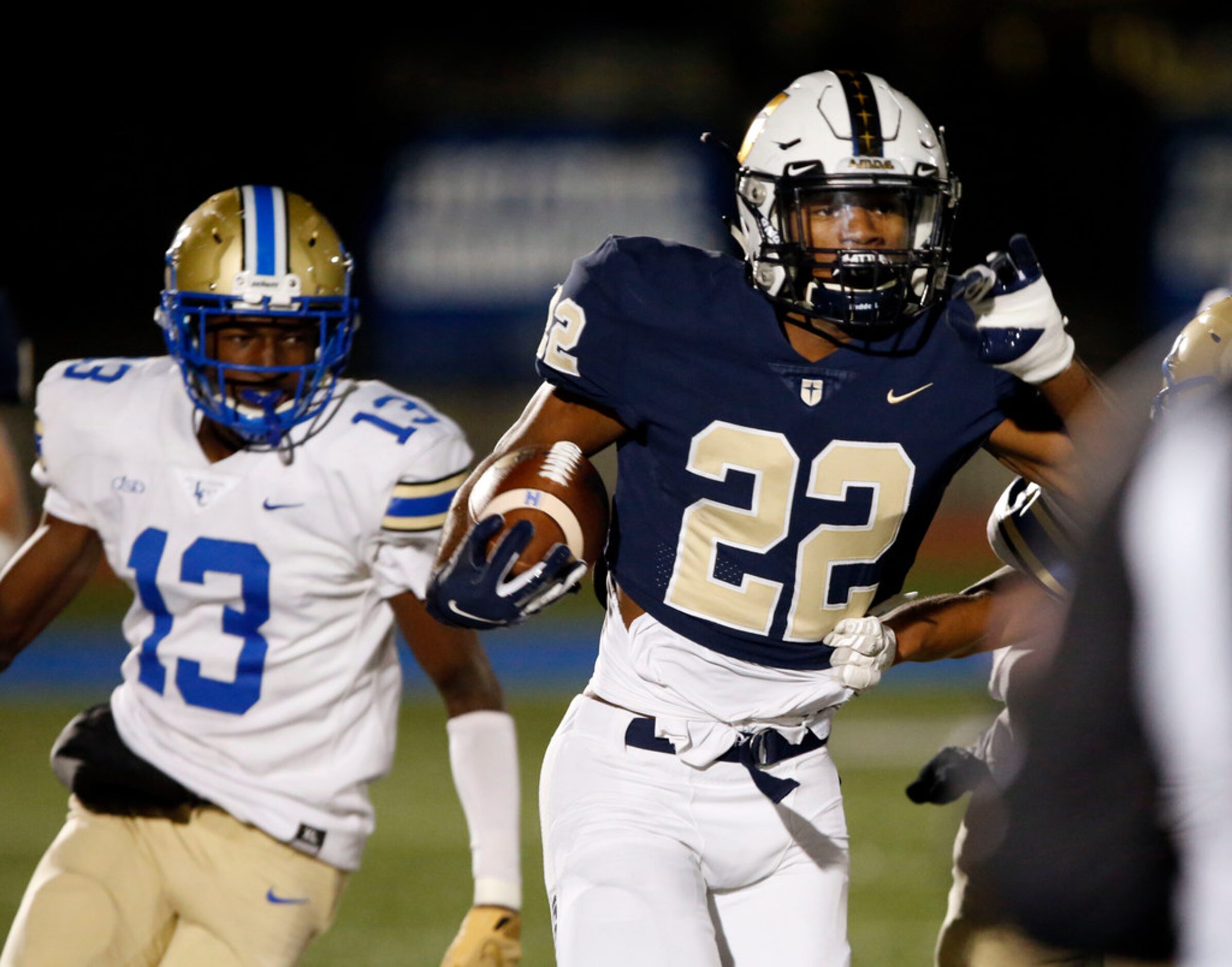 Jesuit WR EJ Smith (22), son of former Dallas Cowboys running back Emmitt Smith, runs for a...