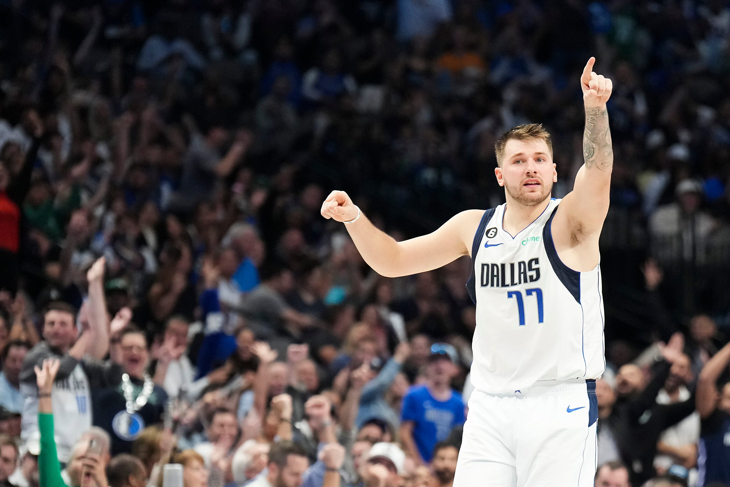 Dallas Mavericks guard Luka Doncic (77) reacts after a Mavericks basket during the second...