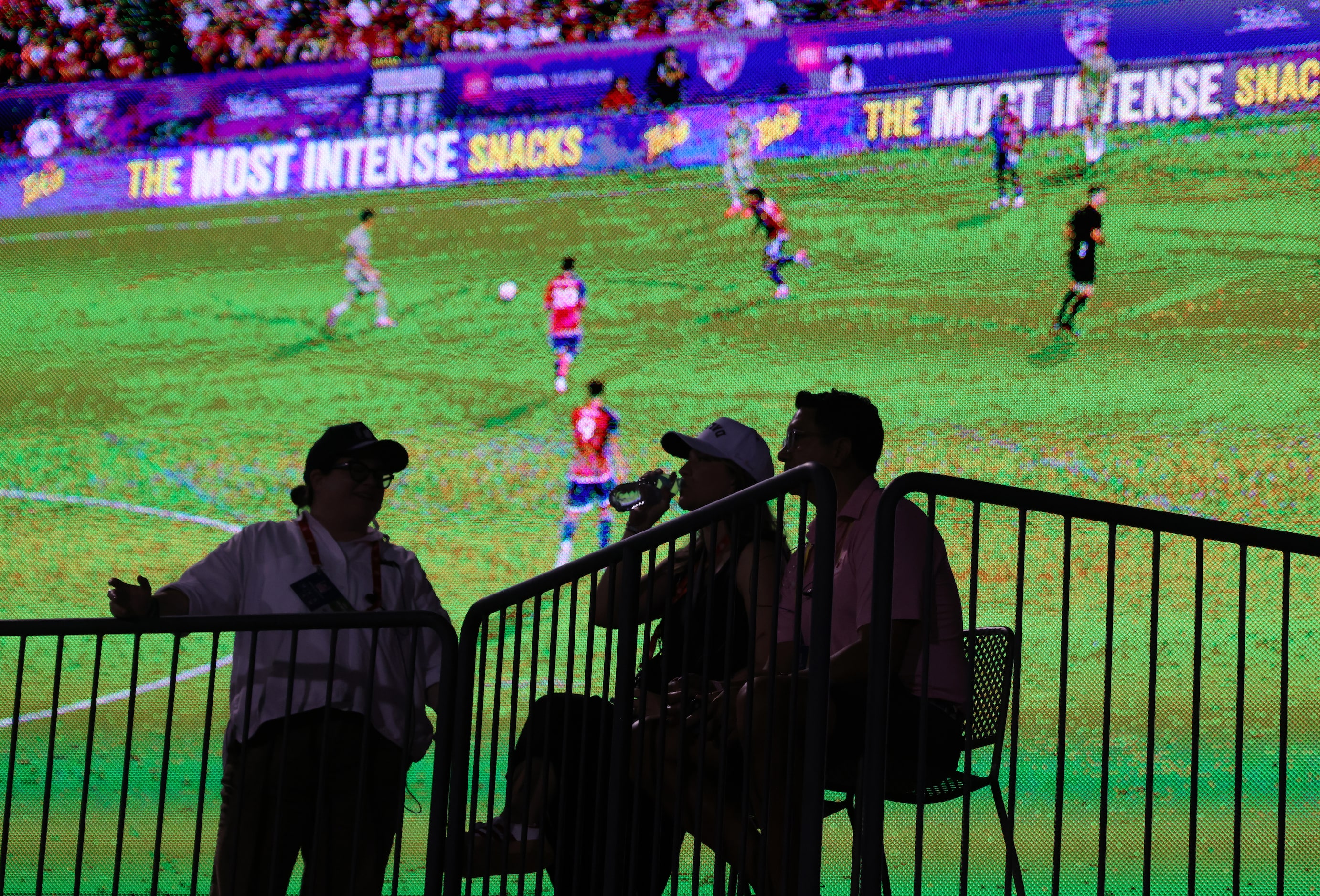 FC Dallas fans take in first half action against LAFC as the game is projected on a big...