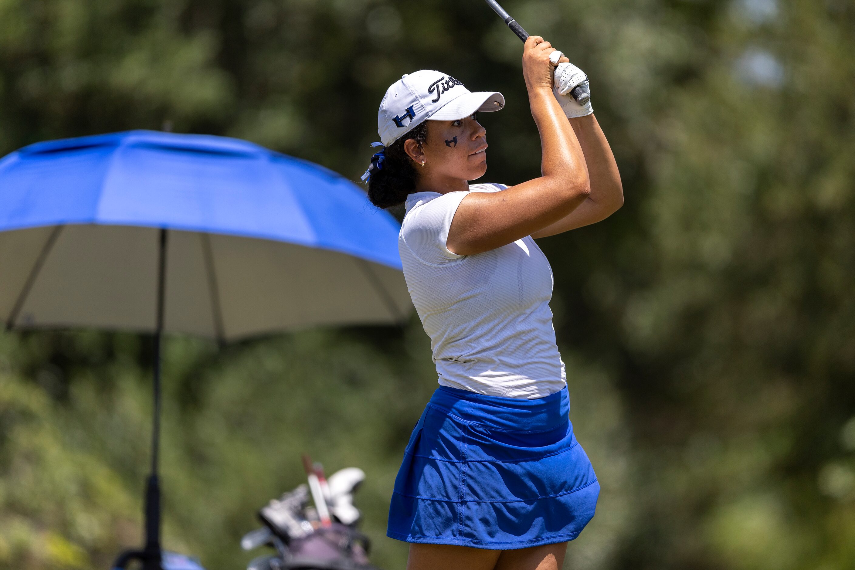 Hebron’s Estelle Seon hits from the 10th tee box during the 6A girls state golf tournament...