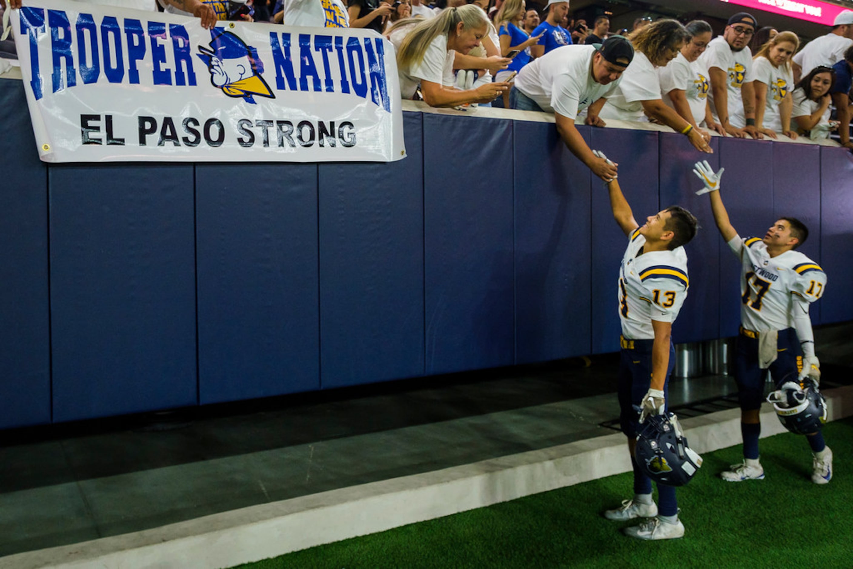 El Paso Eastwood wide receivers AJ Delgado (13) and wide receiver Jadden Moya-Rivera (17)...