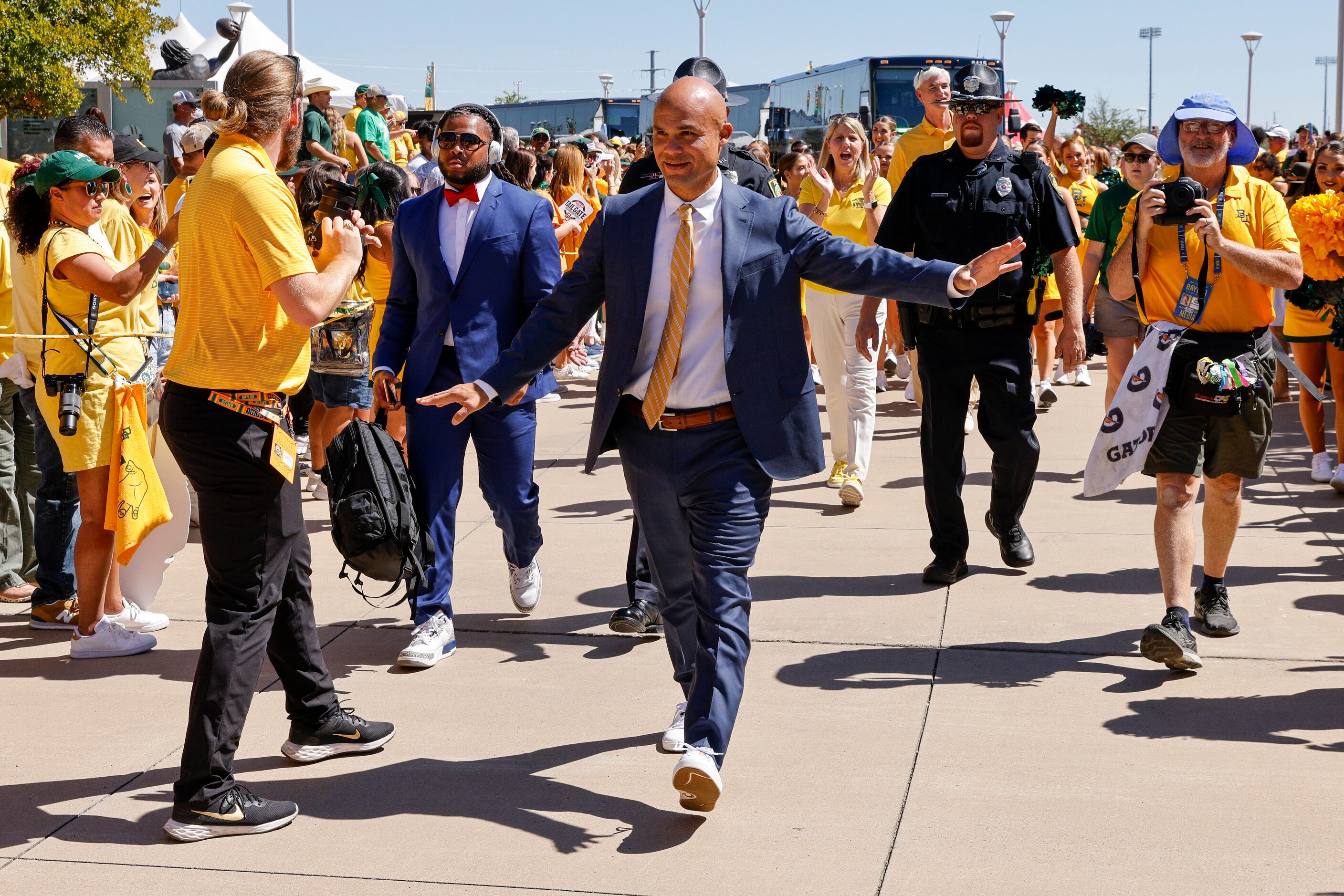 Baylor head coach Dave Aranda waves to fans during the Bear Walk before an NCAA football...