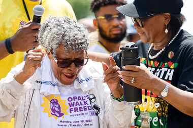 Opal Lee, left, Grandmother of Juneteenth, cheers alongside Cynt Marshall, right,  Chief...