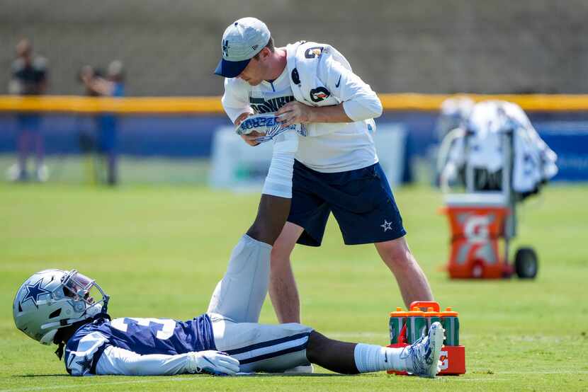 Dallas Cowboys safety Damontae Kazee (35) stretches between drills during the first practice...