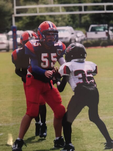 Jaylon Jackson (right) in youth football 