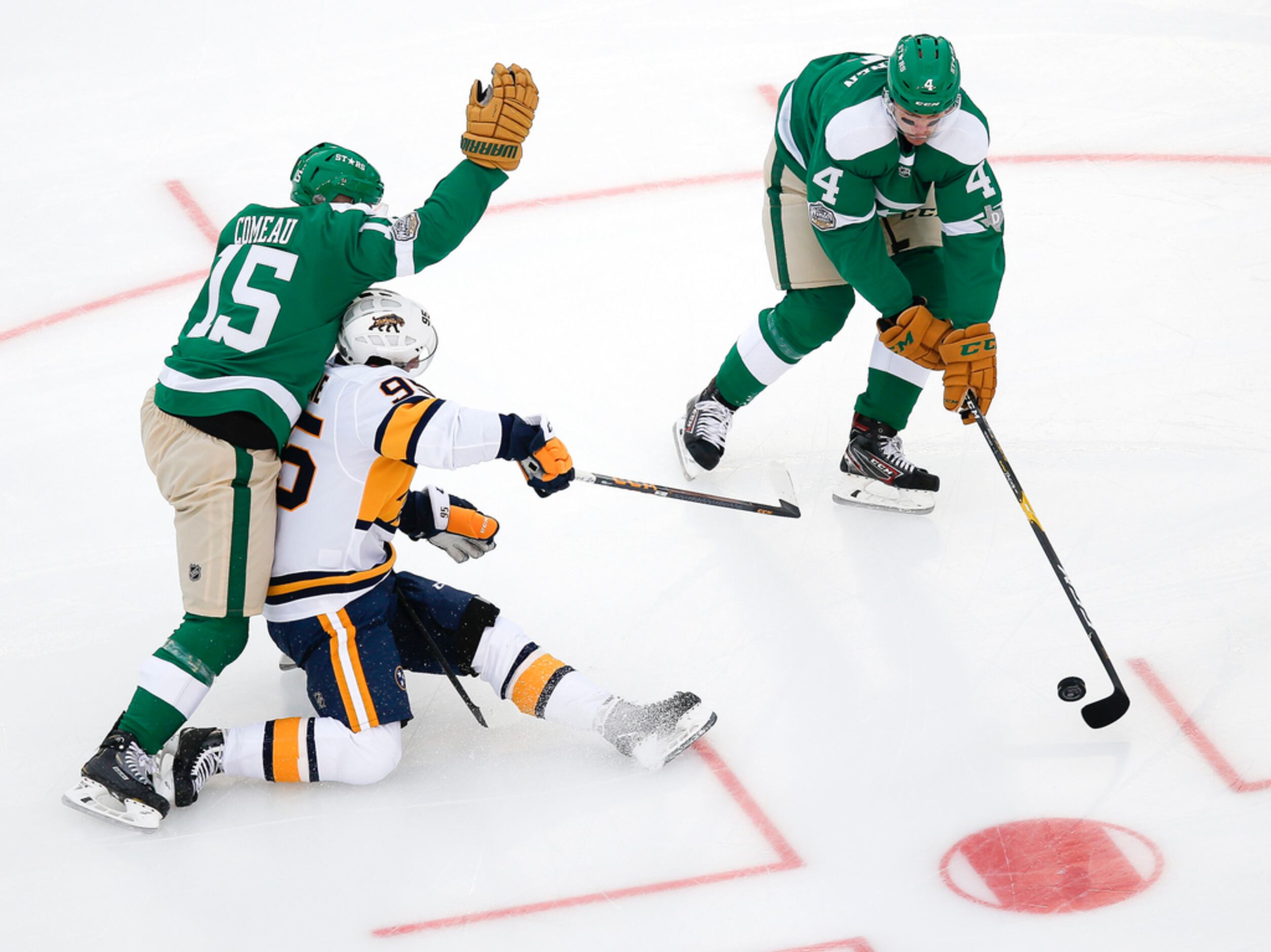 Dallas Stars defenseman Miro Heiskanen (4) takes control of the puck past Nashville...