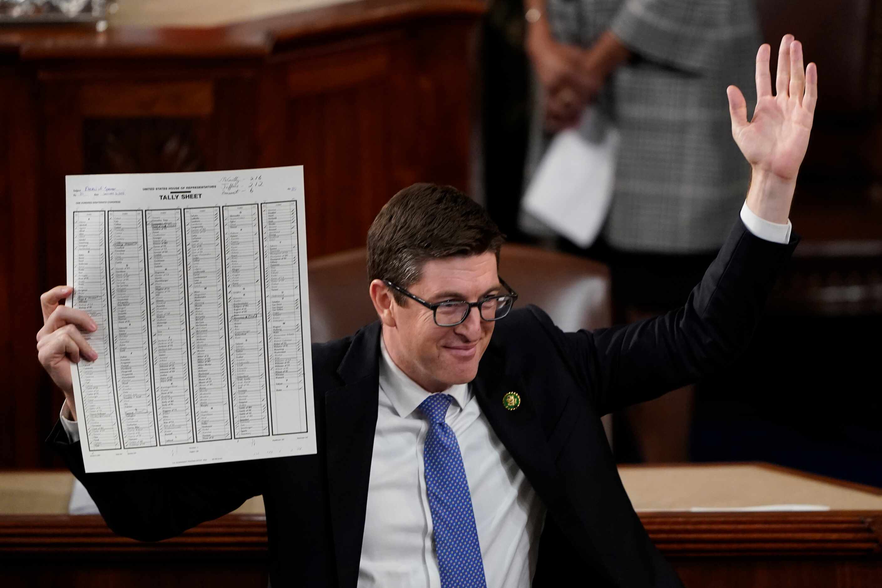 Rep. Bryan Steil, R-Wis., holds up the tally sheet in the House chamber after Rep. Kevin...
