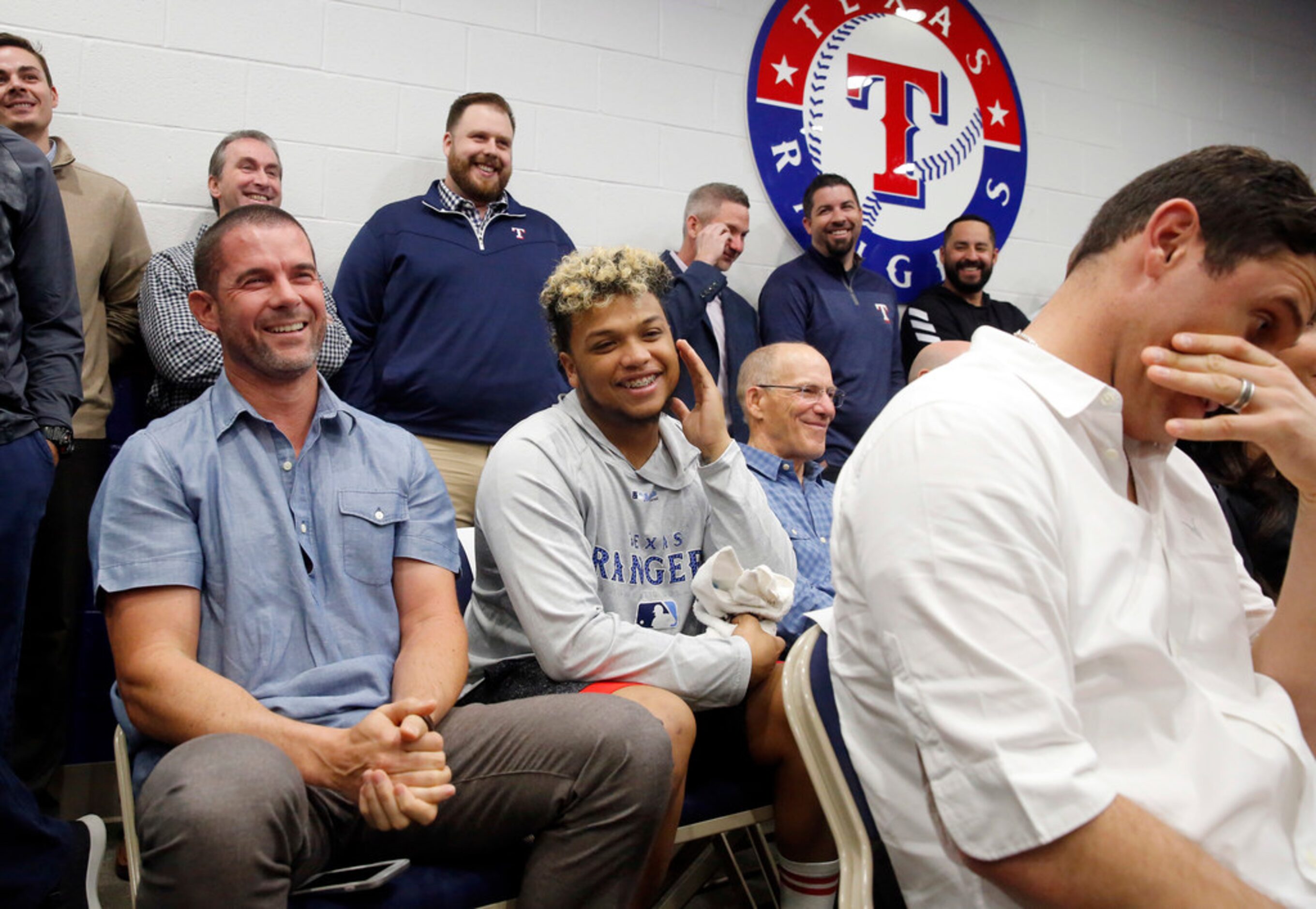 Former Texas Rangers third baseman Michael Young (left) turns red as Adrian Beltre pokes a...