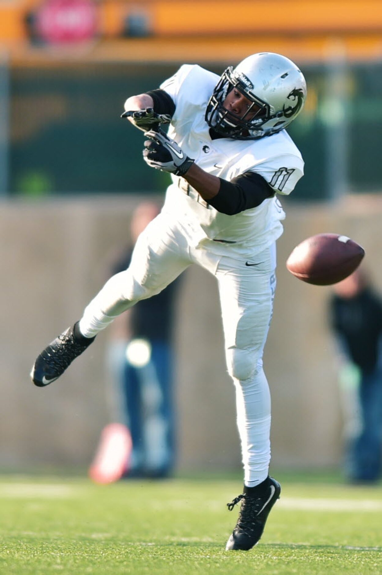 Guyer sophomore wide receiver Donavon Greensward (11) dives but misses a deep pass against...