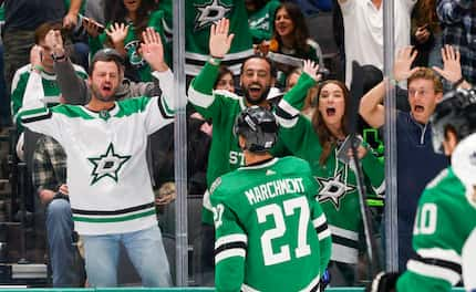 Stars fans cheered a goal by left wing Mason Marchment (27) during the second period of an...