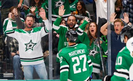 Stars fans cheered a goal by left wing Mason Marchment (27) during the second period of an...