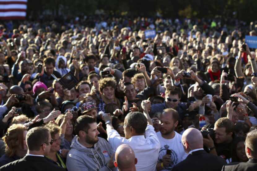 President Barack Obama greeted a throng of supporters Tuesday on the campus of Ohio State...