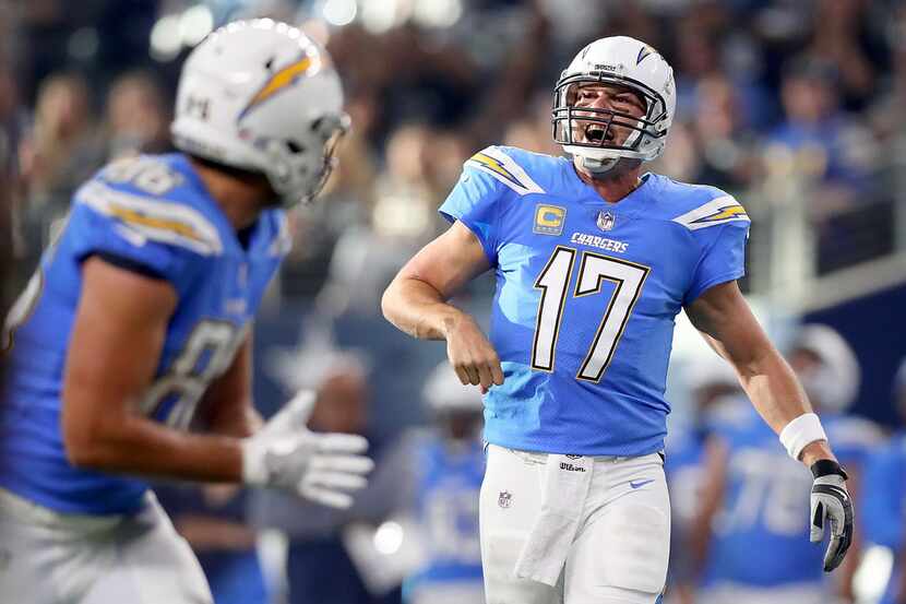 ARLINGTON, TX - NOVEMBER 23:  Philip Rivers #17 of the Los Angeles Chargers reacts against...