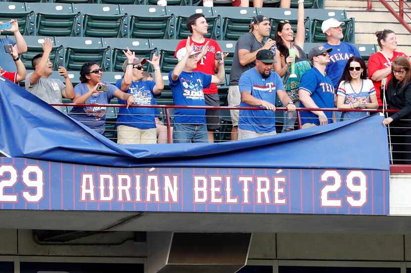 A plaque in left field is unveiled to commemorate former player Adrian Beltre's jersey...