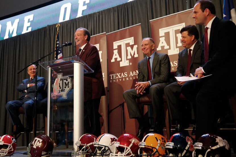 FILE - Texas A&M's new coach Jimbo Fisher gives a speech during a press conference at Kyle...