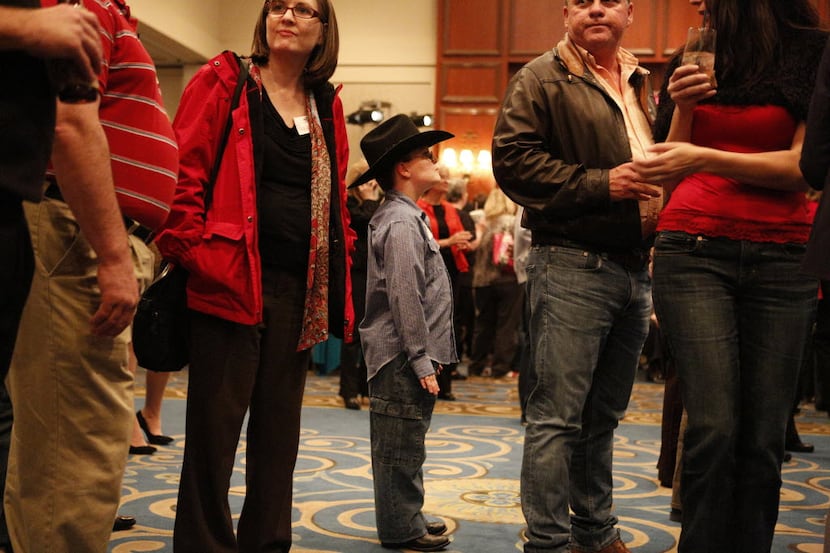 Four years ago, the Dallas County GOP was more stable. Here, Isaac Schear, 8, eagerly...