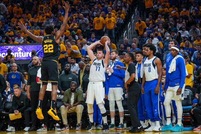 Dallas Mavericks guard Luka Doncic (77) tries to inbounds the ball in front of the Mavericks...