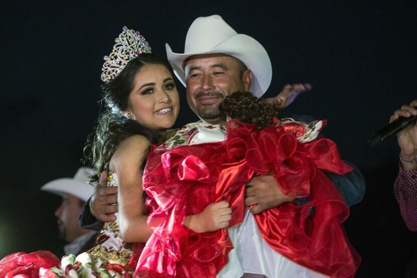 Rubi Ibarra (L) dances with her father Cresencio Ibarra during her 15th birthday...