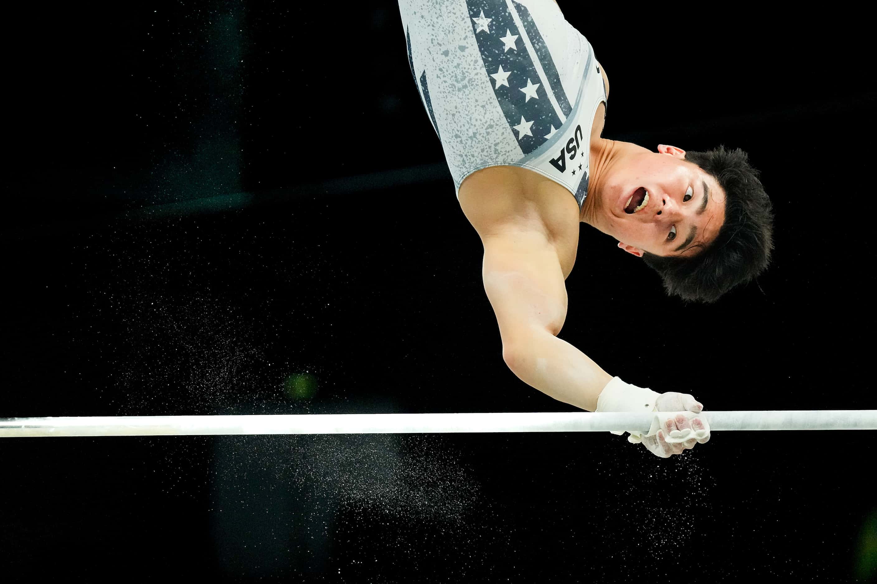 Asher Hong of the United States works on the high bar during gymnastics podium training...