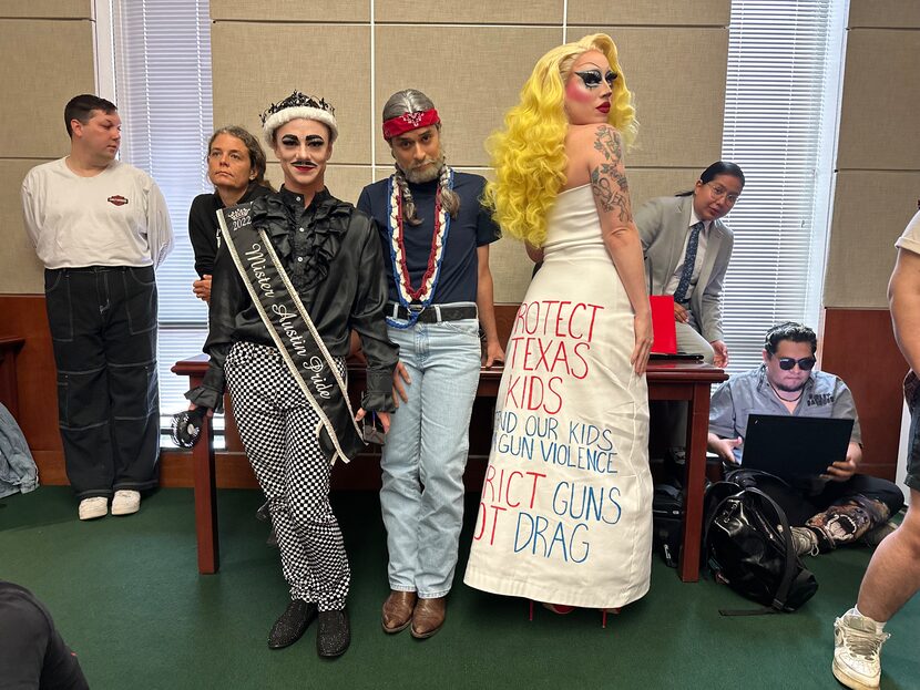 Drag performers Alexander the Great, Travis Randy Travis and Brigitte Bandit wait to testify...