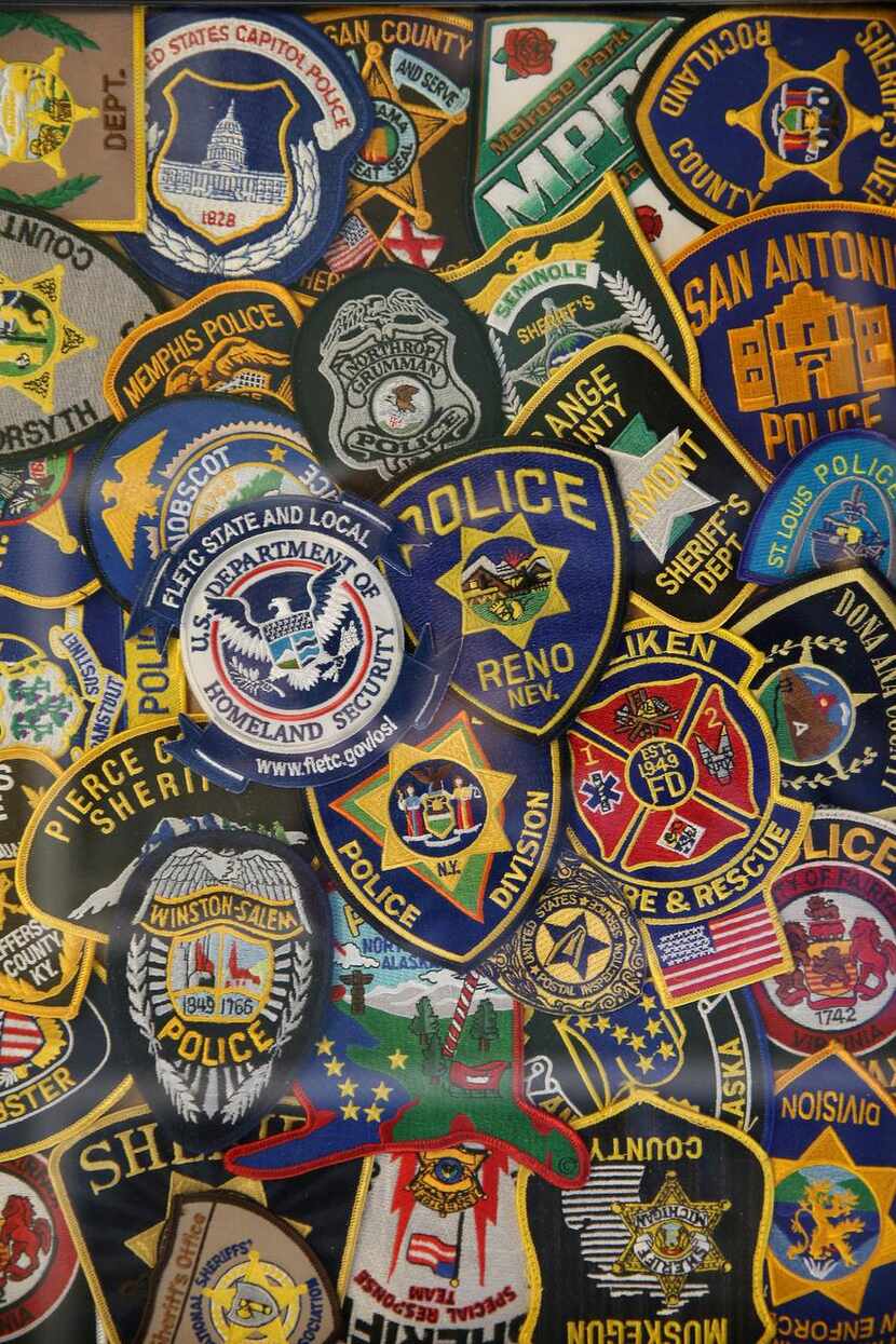 
Collected badges of author and former Dallas Police Department officer John Matthews from...