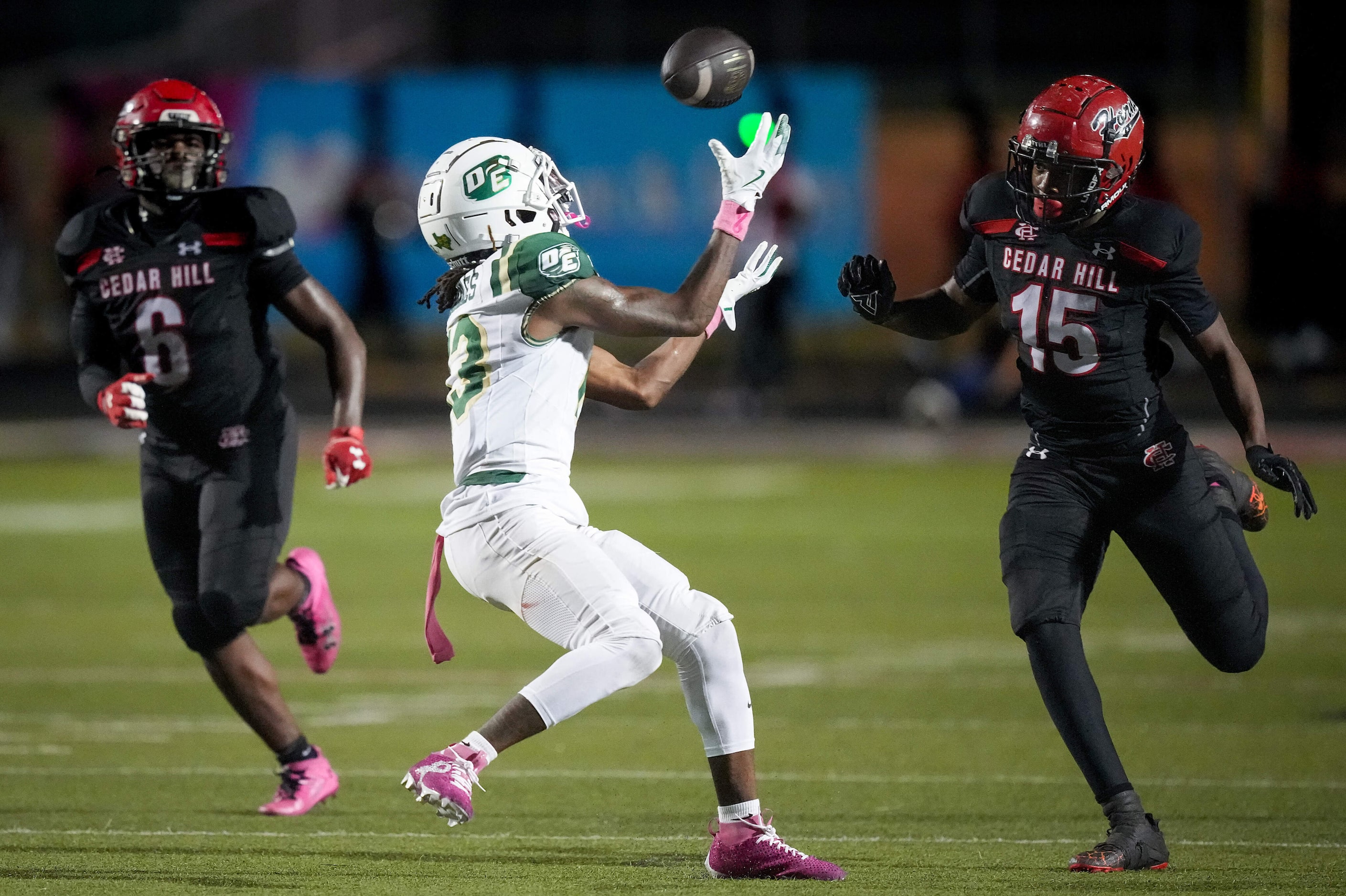 DeSoto wide receiver Daylon Singleton (13) hauls in a 59-yard touchdown pass from...