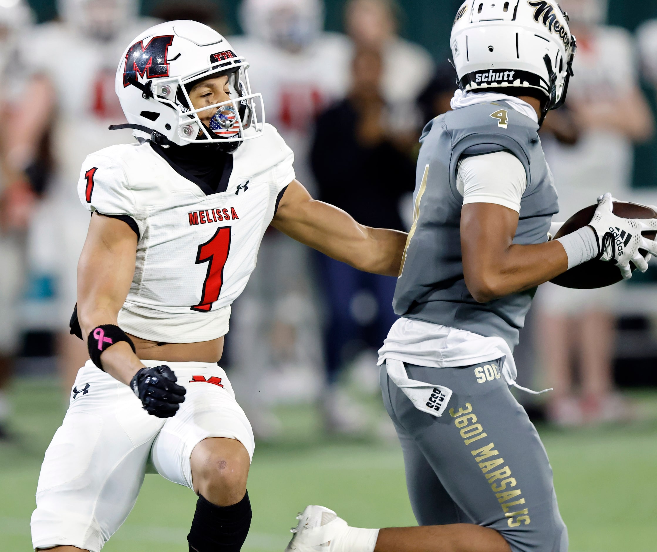 South Oak Cliff defensive back David Spruiells (4) intercepts a pass intended for Melissa...