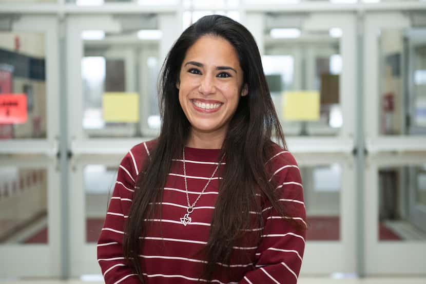Erica Ramos, a second-grade teacher at Mesquite's Henrie Elementary School, works to build a...