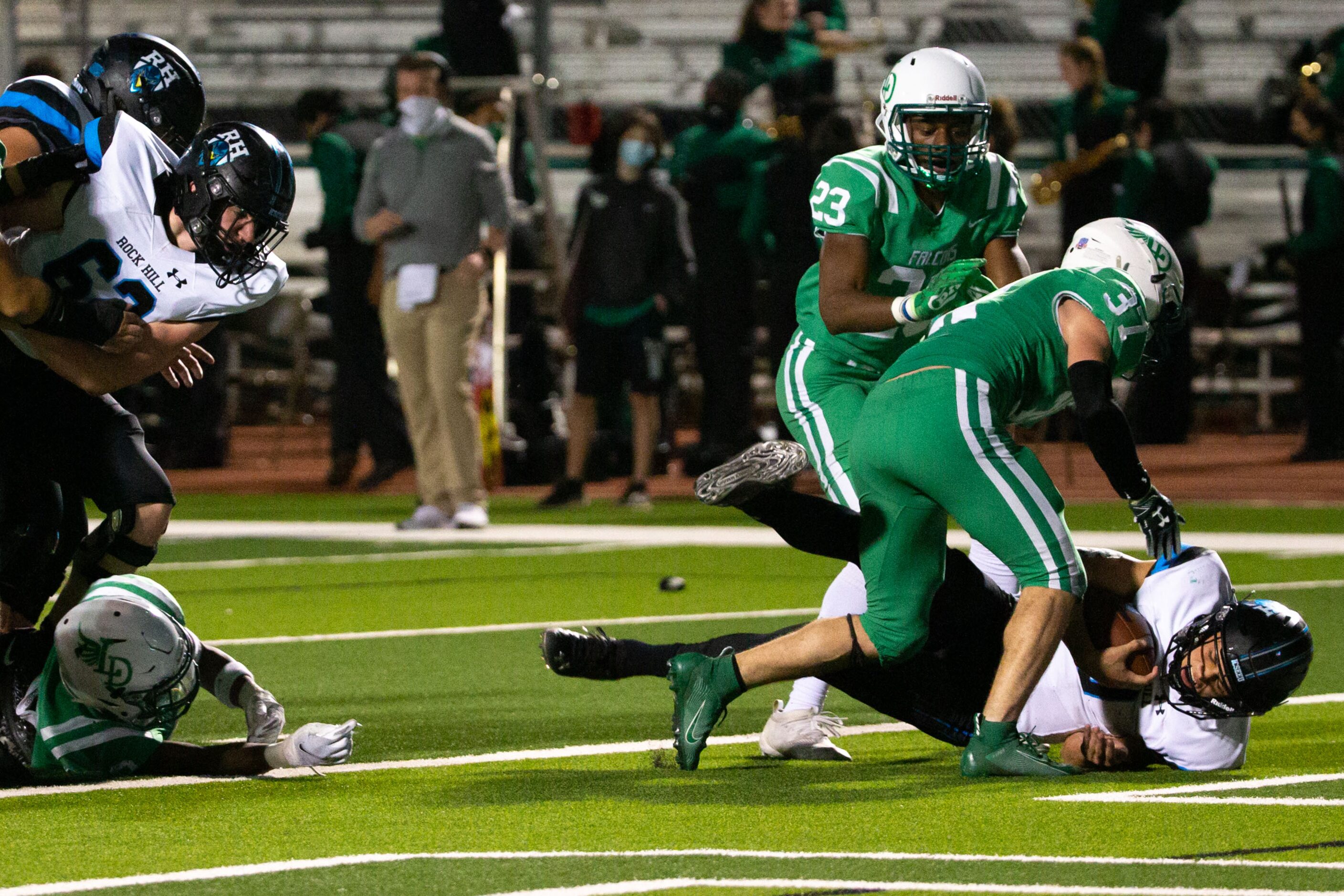 Rock Hill quarterback Brenner Cox (3) scores a touchdown bring the game against Lake Dallas...