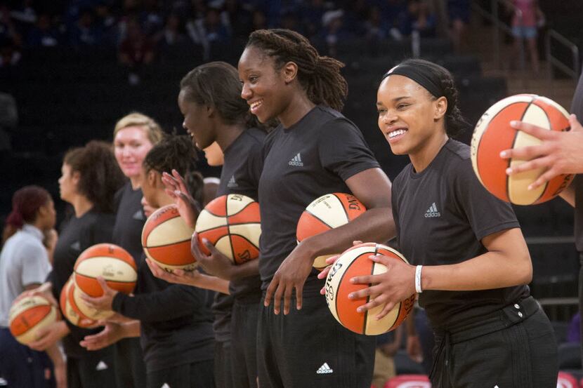 FILE - In this Wednesday, July 13, 2016 file photo, members of the New York Liberty...