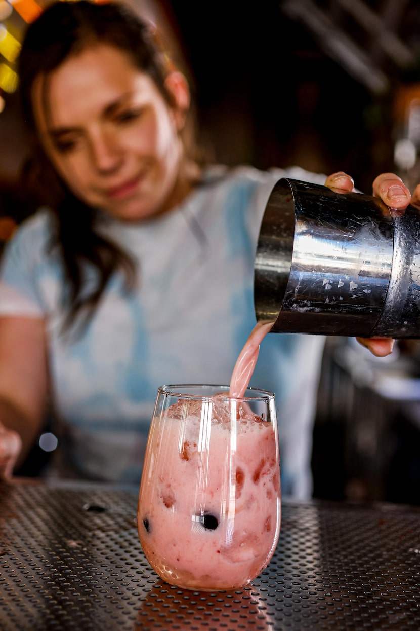 Bartender Melissa Martin makes a Kirby's Drinkland at Farm + Feed in Plano.