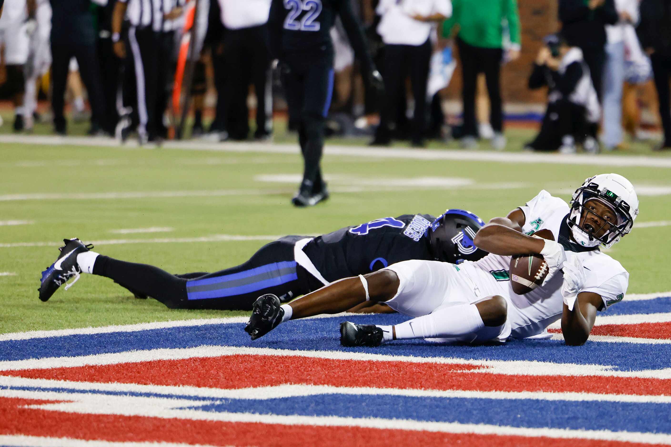 North Texas Mean Green wide receiver Trey Cleveland looks after scoring a touchdown against...
