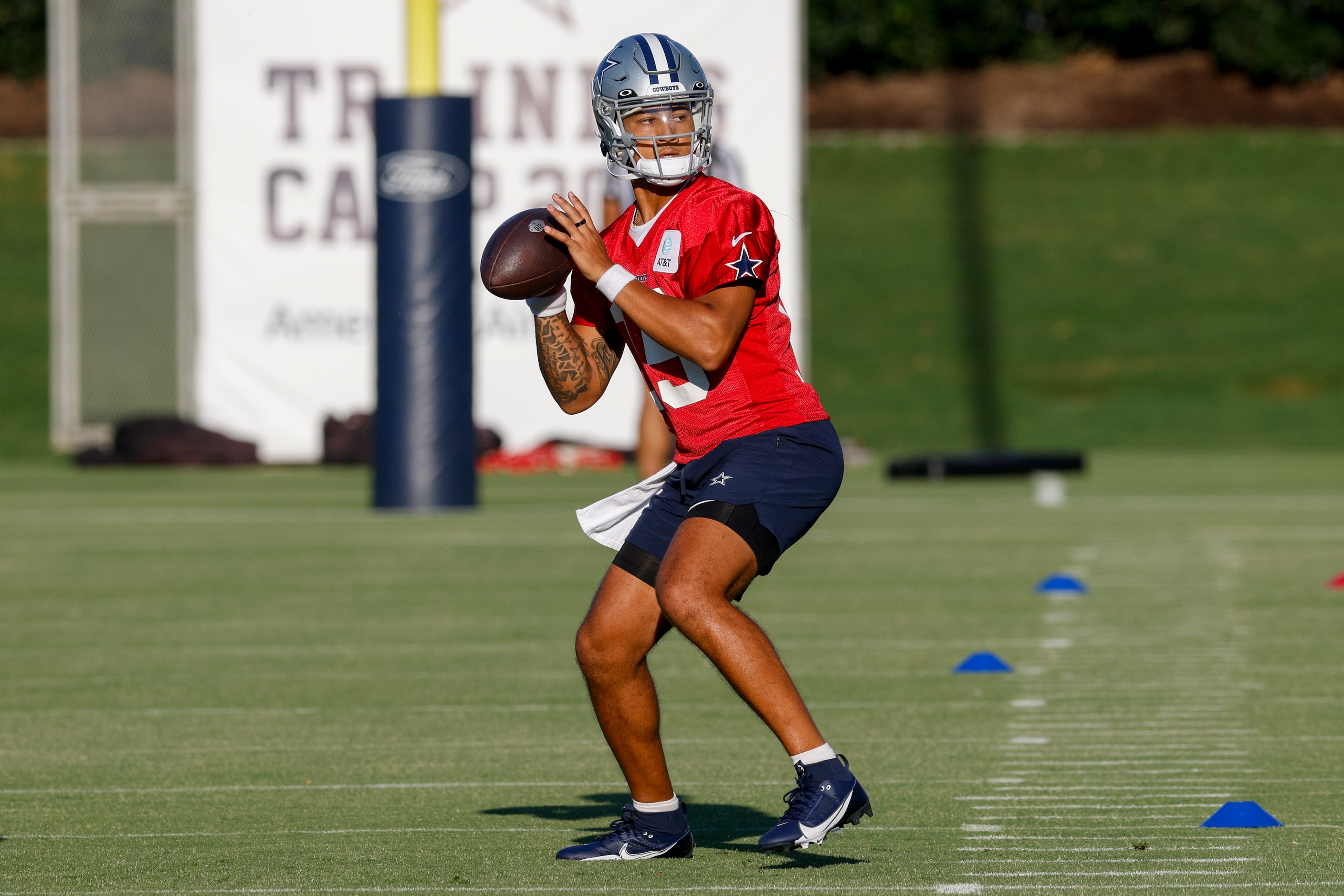 Dallas Cowboys quarterback Trey Lance (15) throws a pass during a practice at The Star,...