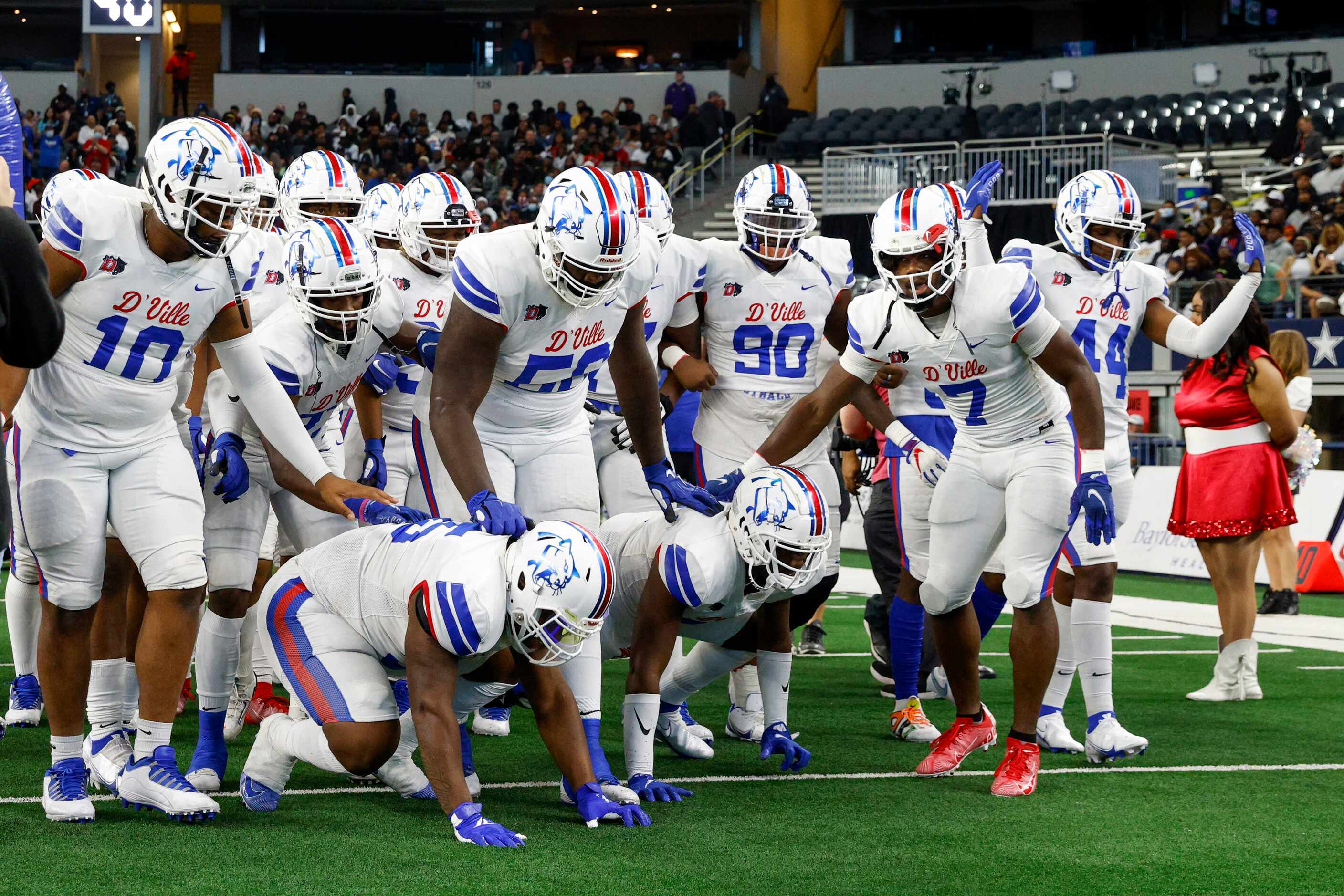 The Duncanville team takes the field before kickoff of their Class 6A Division I state...