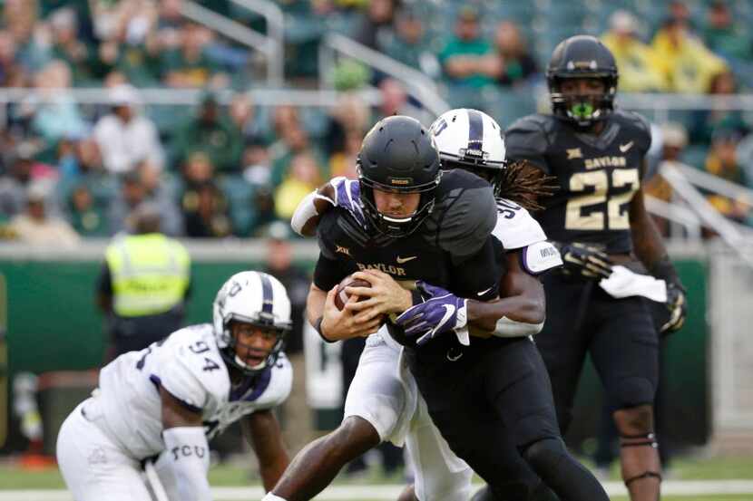 Baylor quarterback Seth Russell (17) scores a touchdown against TCU in the second half at...