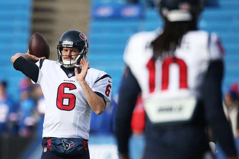 ORCHARD PARK, NY - DECEMBER 06:   T.J. Yates #6 of the Houston Texans warms up before the...