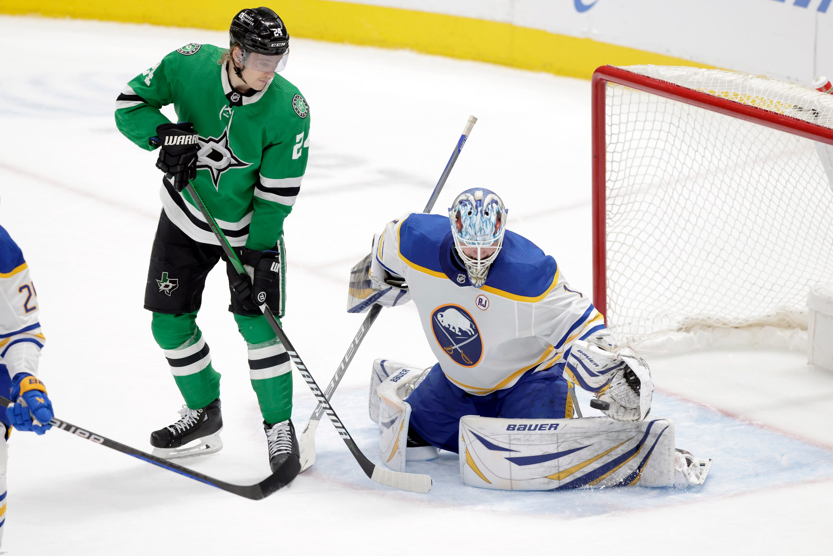 Buffalo Sabres goaltender Ukko-Pekka Luukkonen (1) snares a shot in front of Dallas Stars...