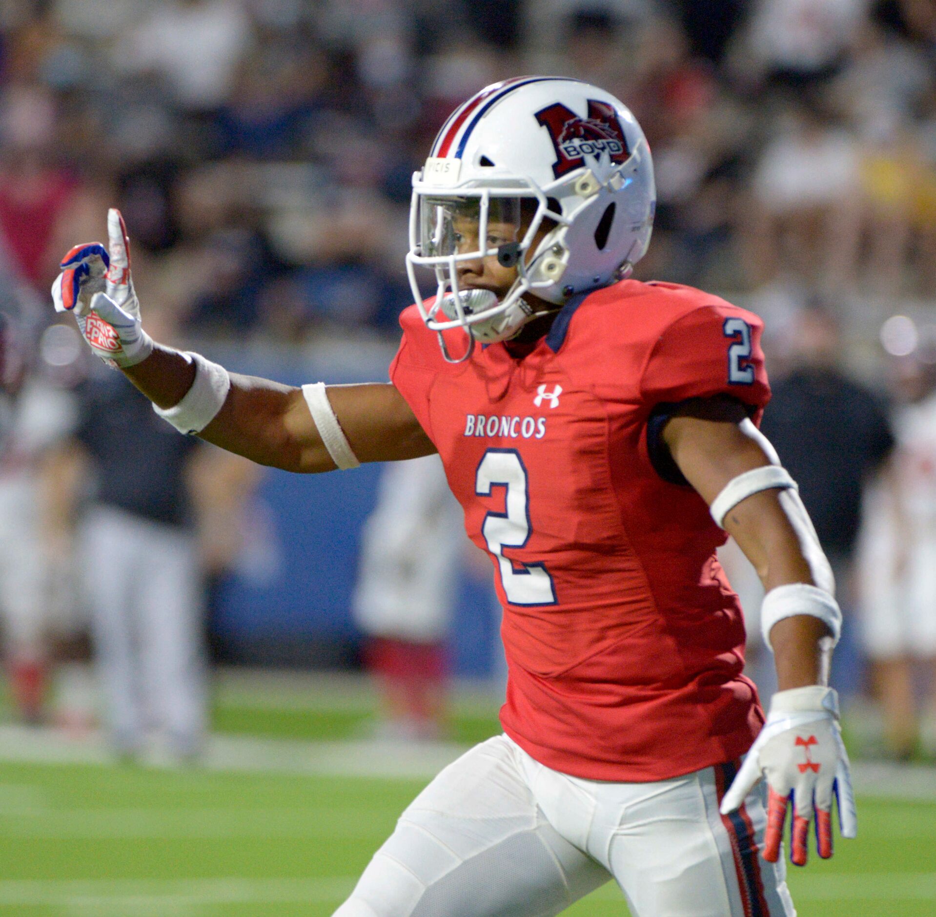 McKinney Boyd’s Ty Bolden celebrate after a fourth down stop in the first quarter of a high...