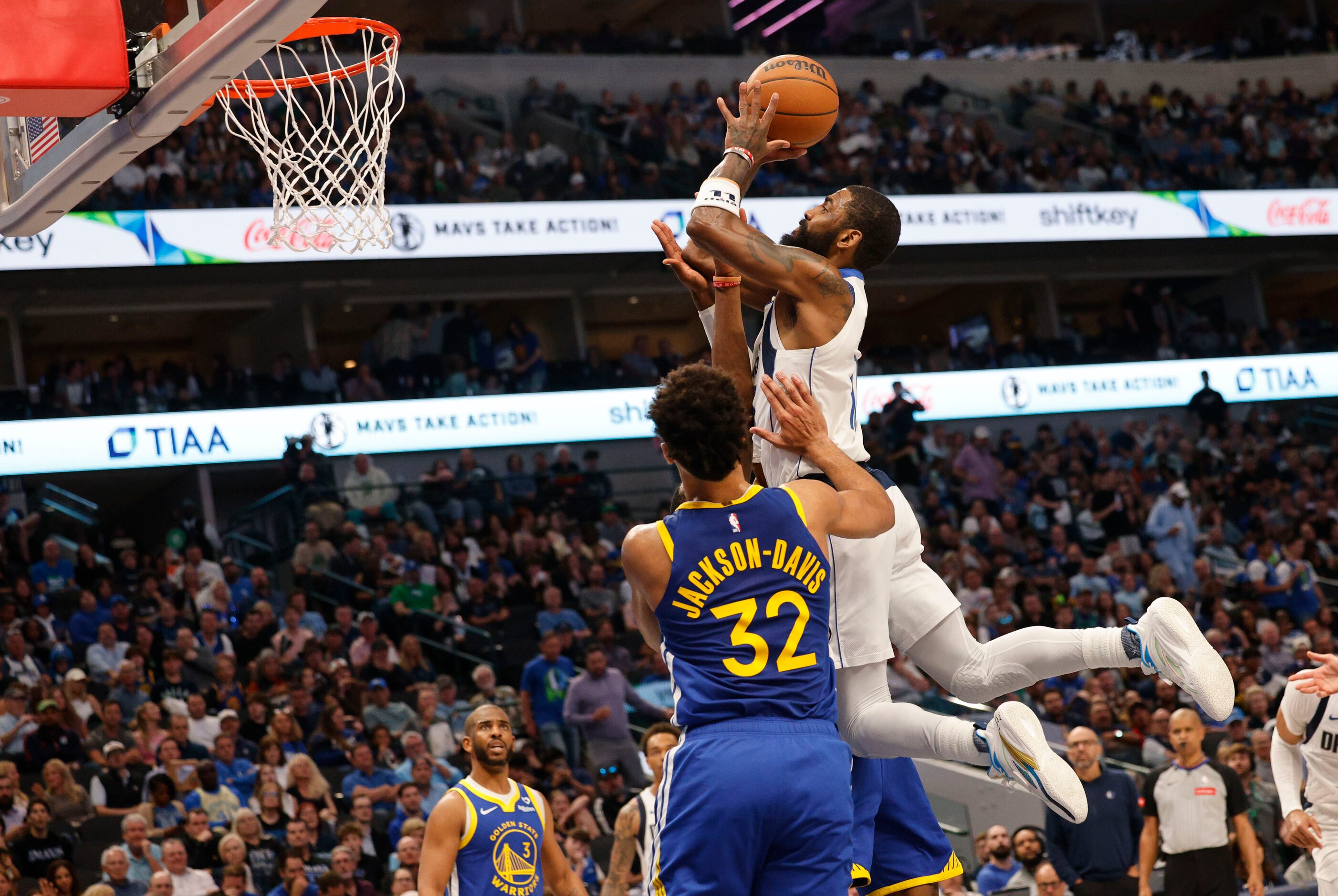 Dallas Mavericks guard Kyrie Irving (11) attempts a jump shot as Golden State Warriors...