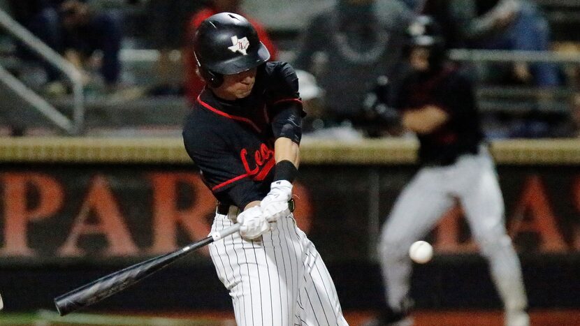 Lovejoy High School Aidan Smith (13) makes contact in the third inning as Lovejoy High...