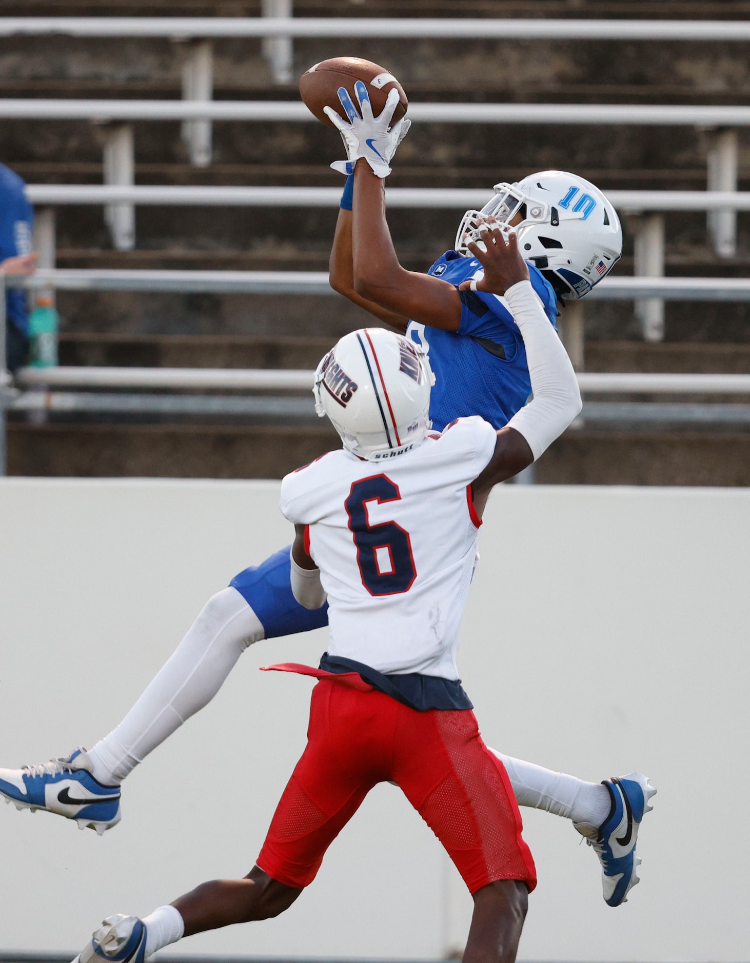 Midlothian's Brendyn Jackson (10) catches a pass to score against Kimball's Jarvis Newhouse...