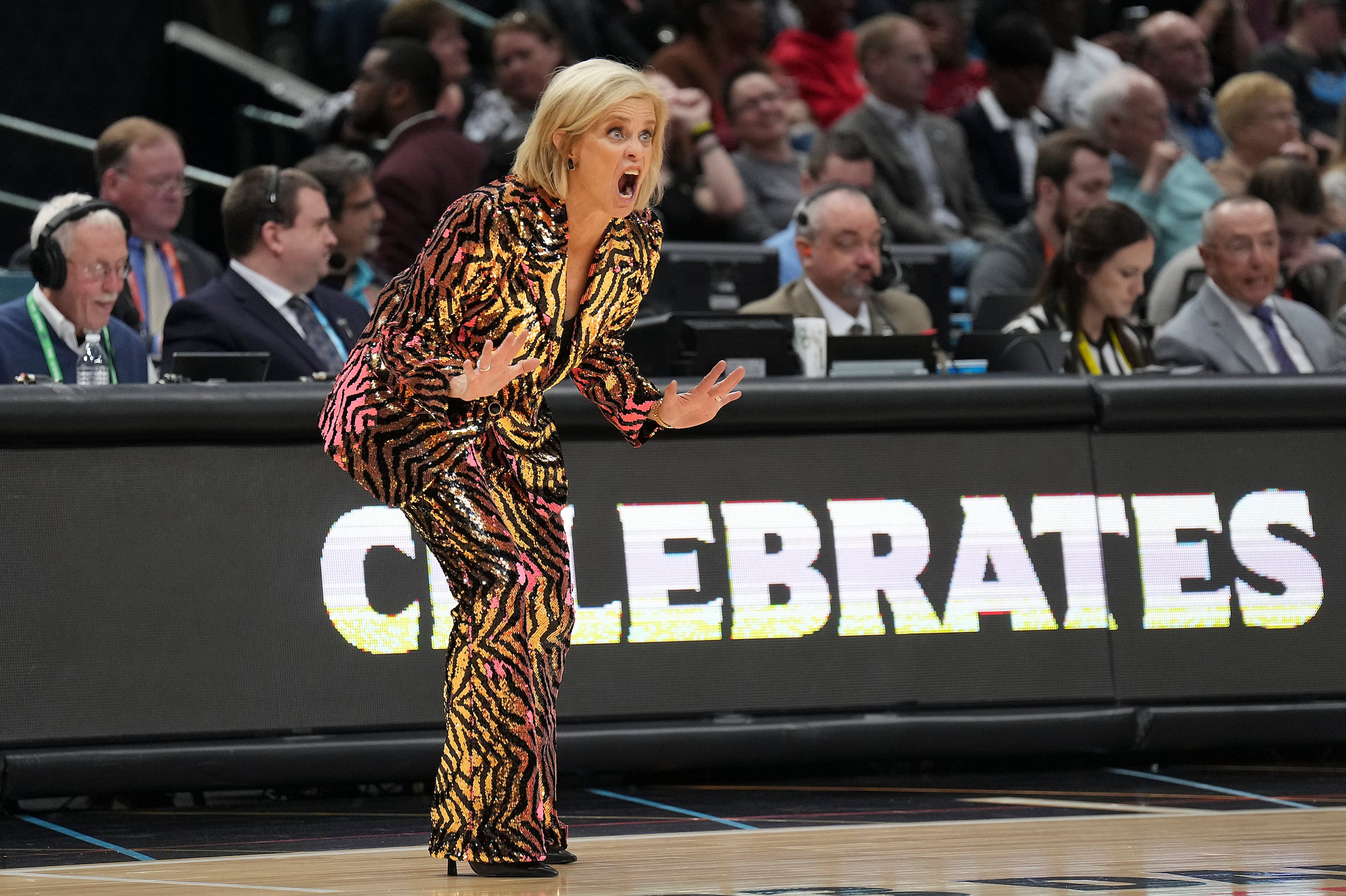 LSU Coach Kim Mulkey wins NCAA Championship in dazzling tiger print suit