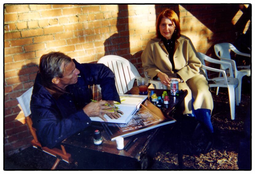 Karen Blessen talks with Peter Beard during the exhibit of his works at the Boyd Gallery in...