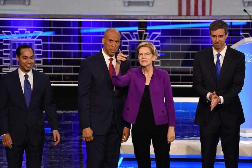 Former housing secretary Julian Castro, Sen. Cory Booker, Sen. Elizabeth Warren and former...