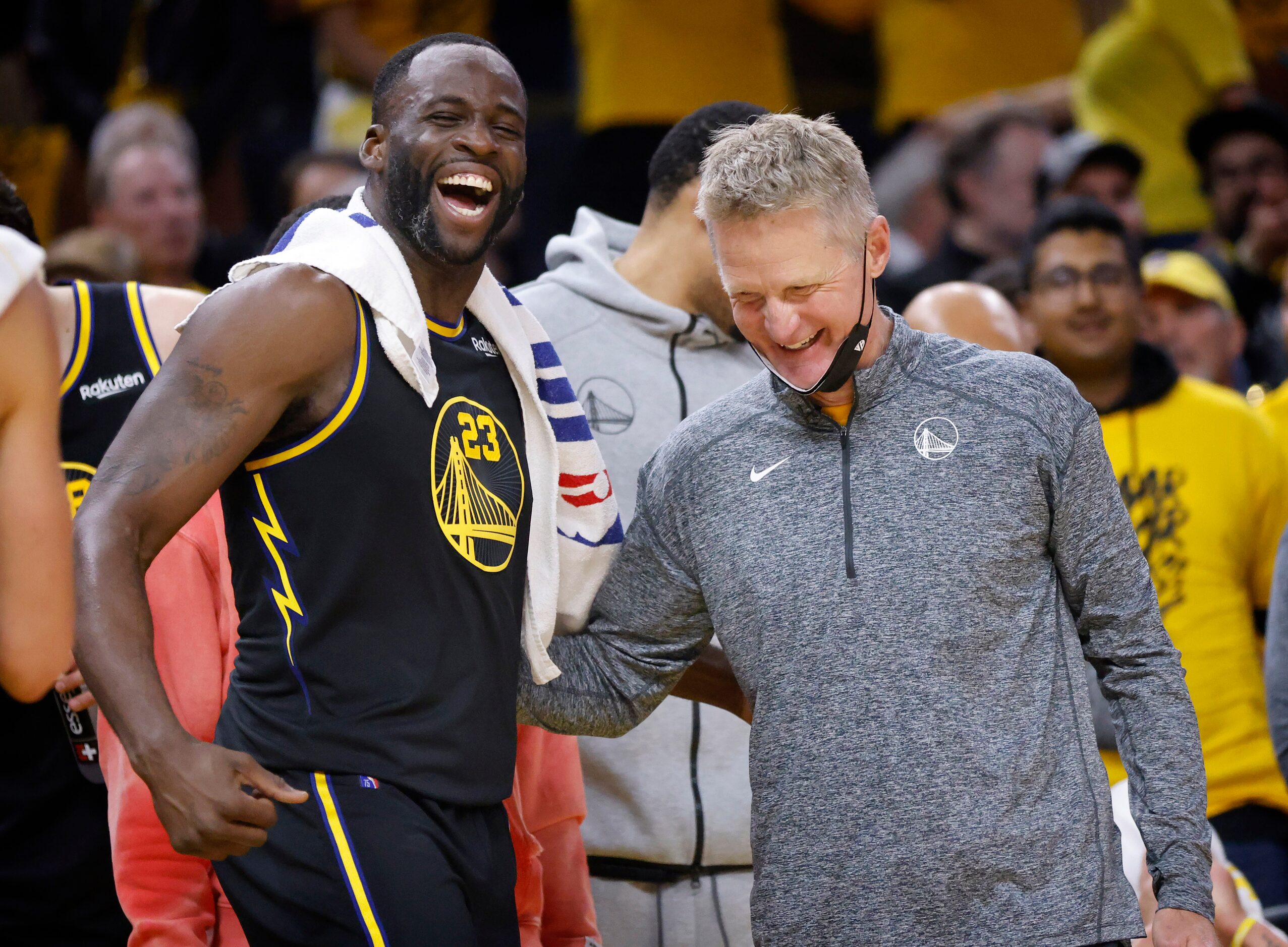 Golden State Warriors head coach Steve Kerr (right) and forward Draymond Green (23)...