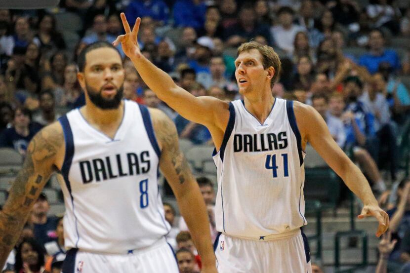 Dallas Mavericks forward Dirk Nowitzki (41) gestures after hitting a shot, as Dallas...
