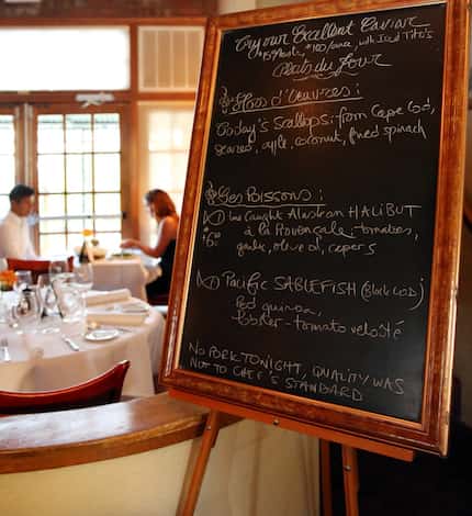 Specials at Saint-Emilion are featured on a blackboard.