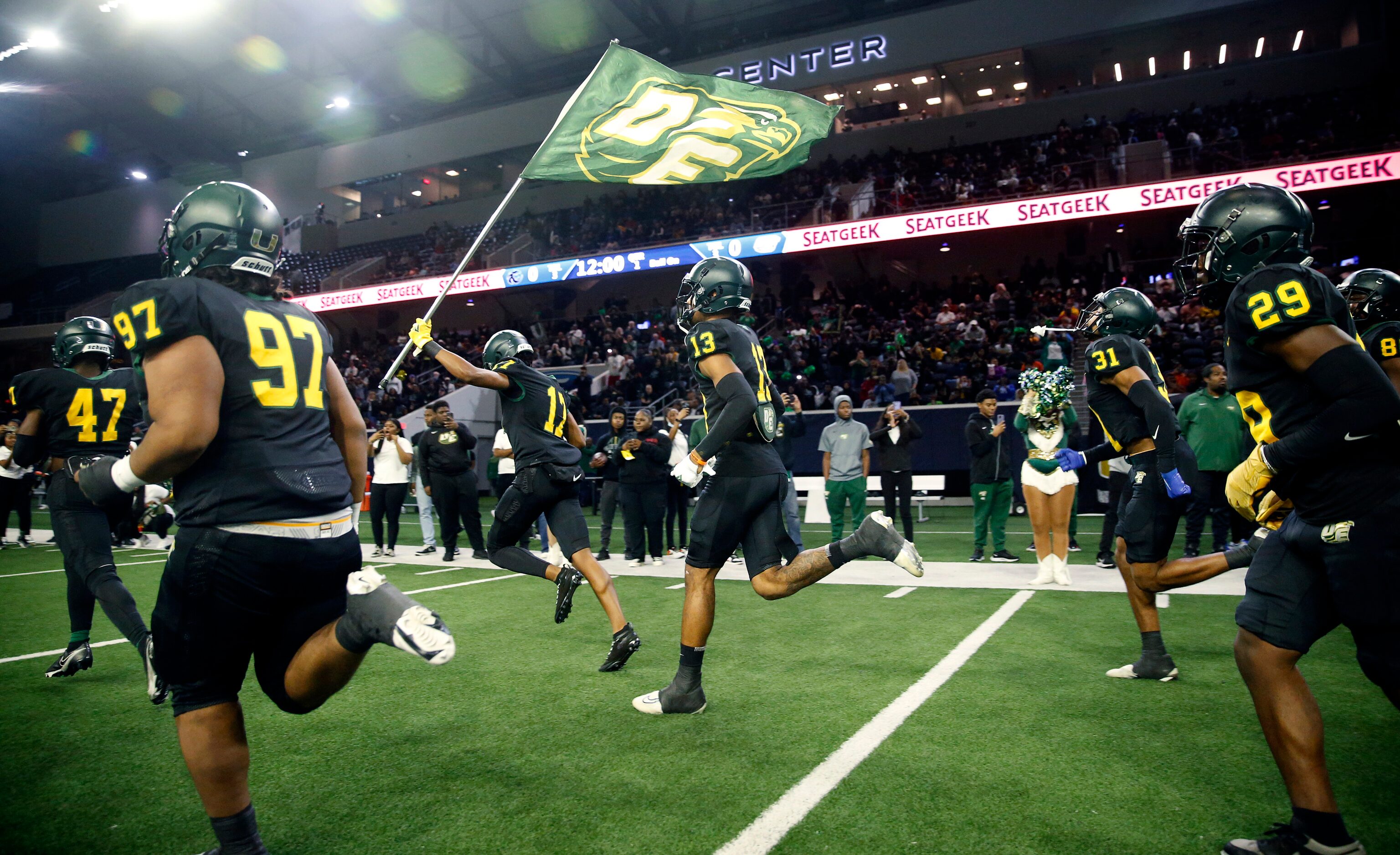 The DeSoto football team takes the field to face Denton Guyer in their Class 6A Division II...