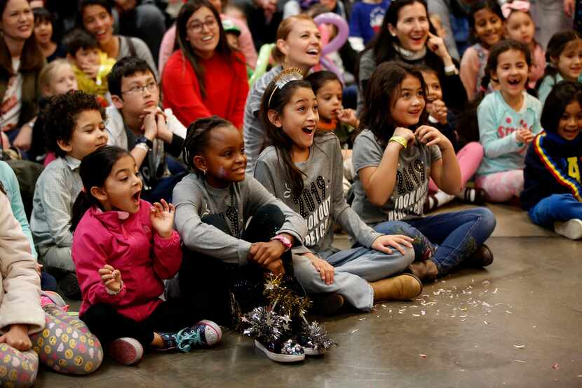 Children watched a liquid nitrogen demonstration during a 2018 New Year’s Eve event at the...