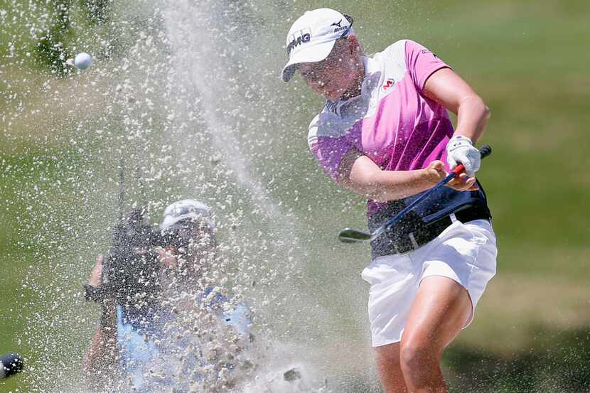 IRVING, TX - MAY 04:  Stacy Lewis hits out of a bunker on the 11th hole during the Final...